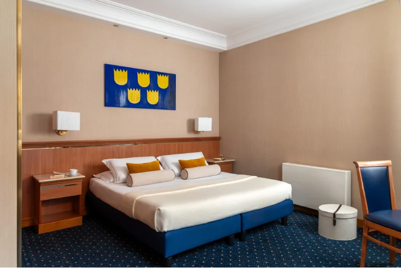 Camera Tripla ampia e luminosa con letto matrimoniale e spazio aggiuntivo, ideale per famiglie e piccoli gruppi a Roma - Hotel Diocleziano, BZAR hotels a Roma